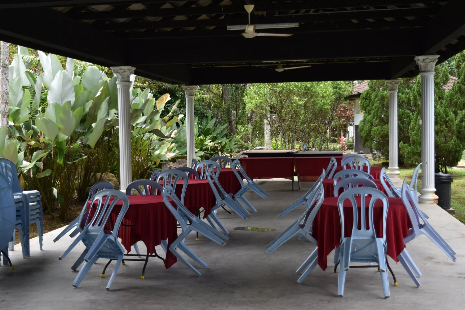 Grand Outdoor Hall set with tables and red tablecloths